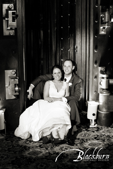 Newlyweds seated in bank vault of Franklin Plaza NY